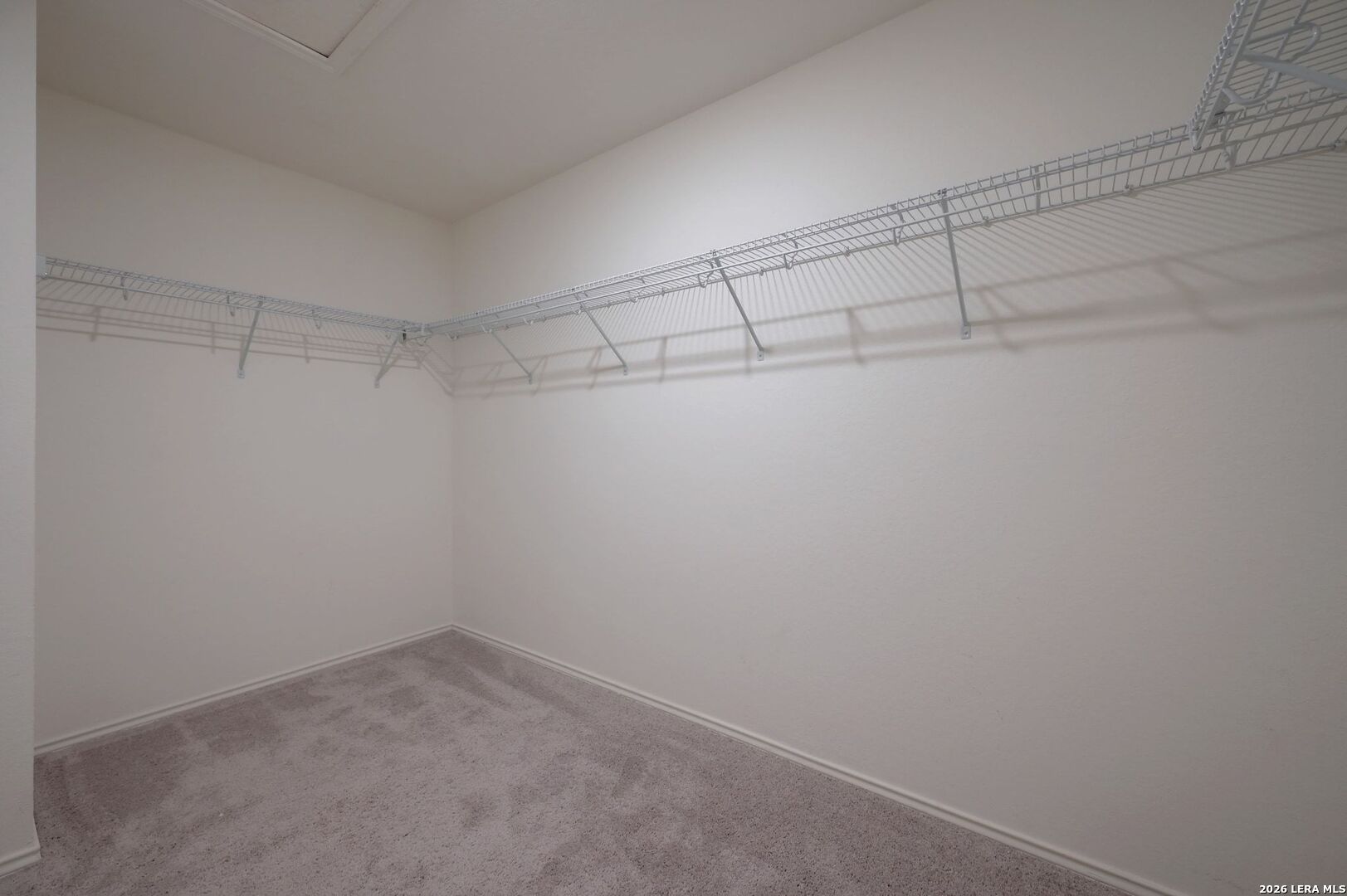 5535 Rue Girard Converse, TX 78109 - Photo 26 of 33 a view of a room with racks on the wall