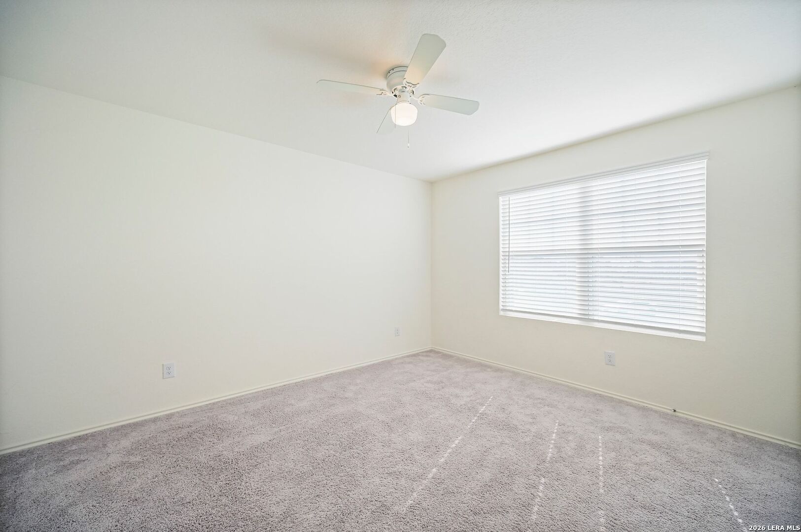 5535 Rue Girard Converse, TX 78109 - Photo 27 of 33 an empty room with a window