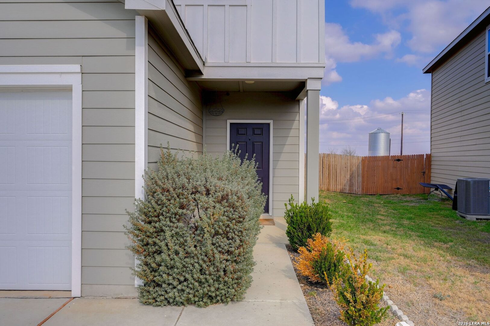 5535 Rue Girard Converse, TX 78109 - Photo 3 of 33 a front view of a house with garden
