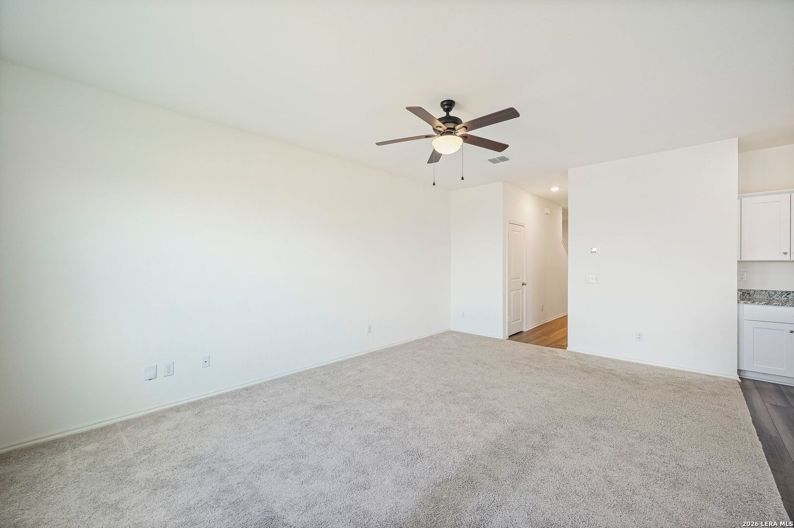 5535 Rue Girard Converse, TX 78109 - Photo 8 of 33 a view of a big room with carpet