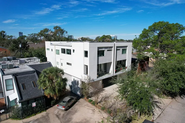 an aerial view of a city with lots of residential buildings