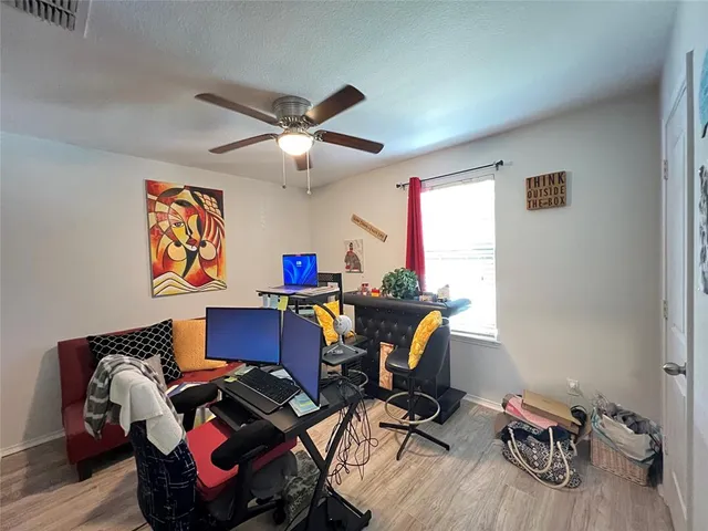 a workspace with furniture and a window