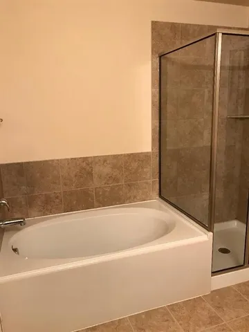 a bathroom with a bathtub