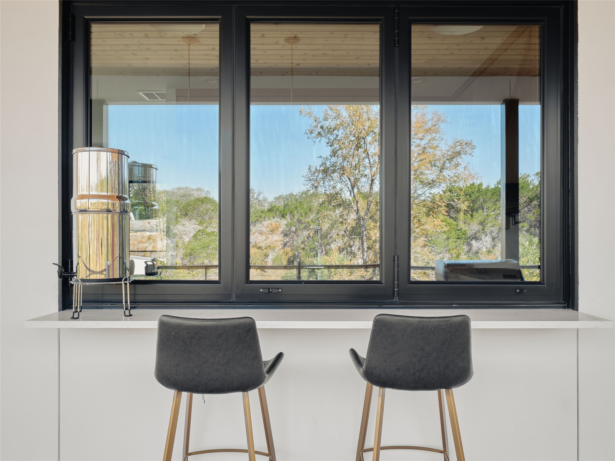 3214 Smoky Ridge, Unit LOT A Austin, TX 78730 - Photo 15 of 32 a bathroom with a large window and a bathtub