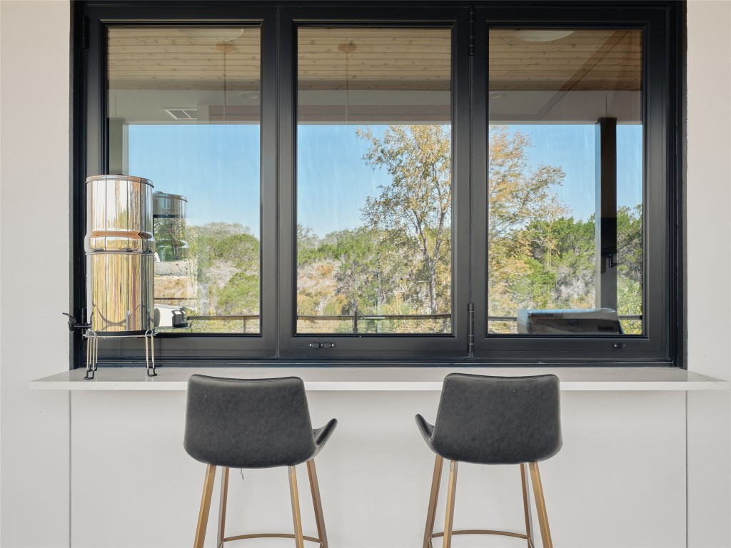 3214 Smoky Ridge, Unit LOT A Austin, TX 78730 - Photo 15 of 32 a bathroom with a large window and a bathtub