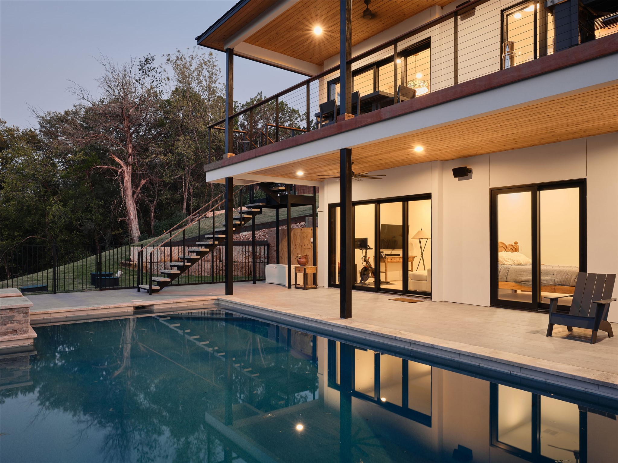 3214 Smoky Ridge, Unit LOT A Austin, TX 78730 - Photo 16 of 32 a view of a swimming pool with an outdoor seating