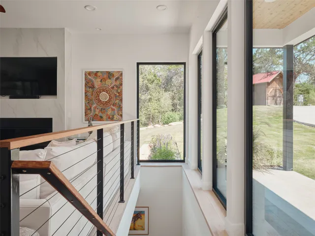 a view of a living room with a flat screen tv