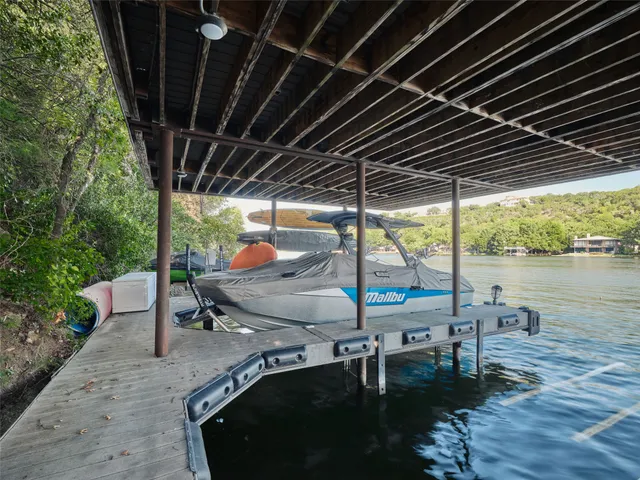 a view of a swimming pool with a porch
