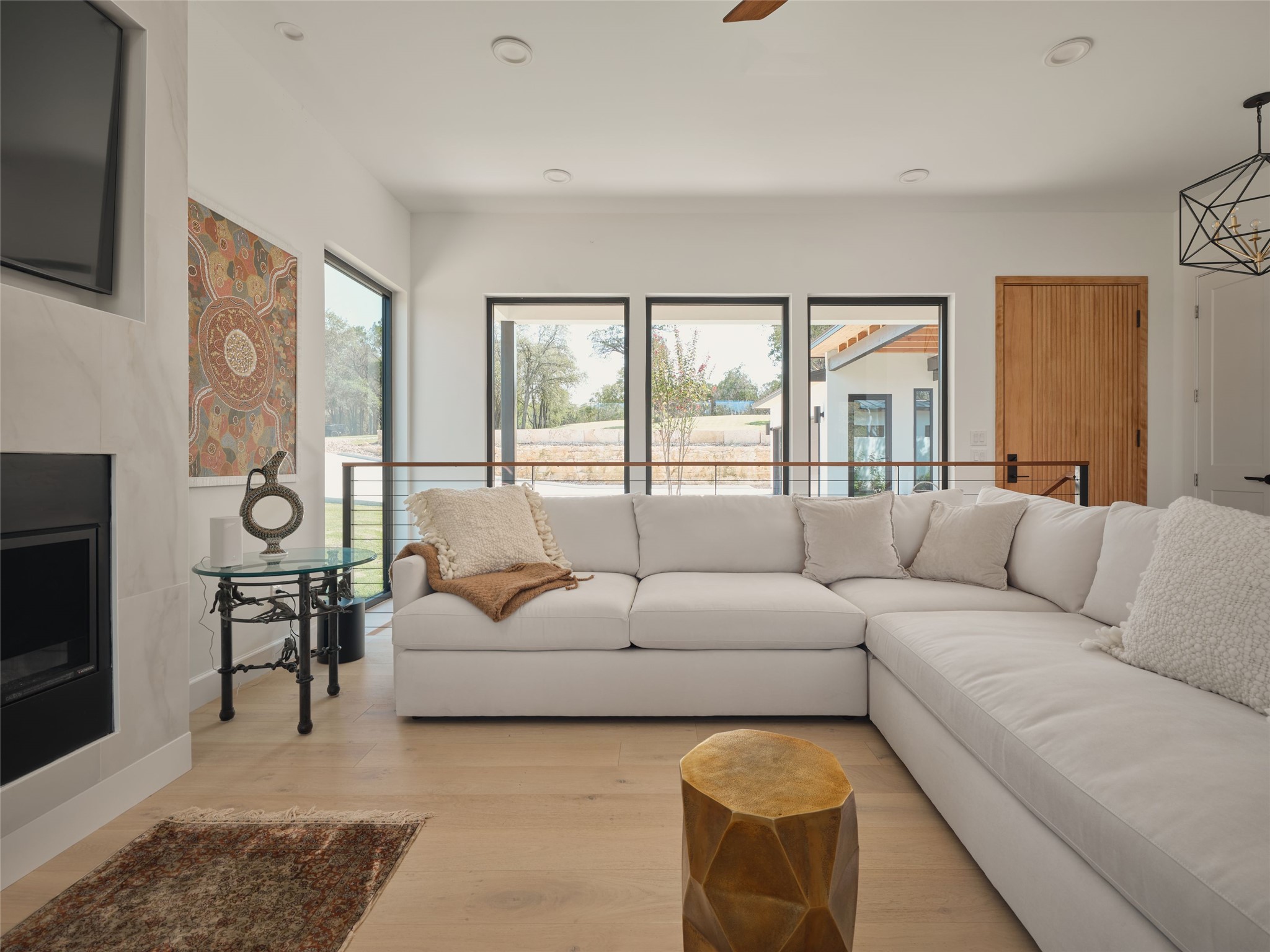 3214 Smoky Ridge, Unit LOT A Austin, TX 78730 - Photo 9 of 32 a living room with furniture and a flat screen tv