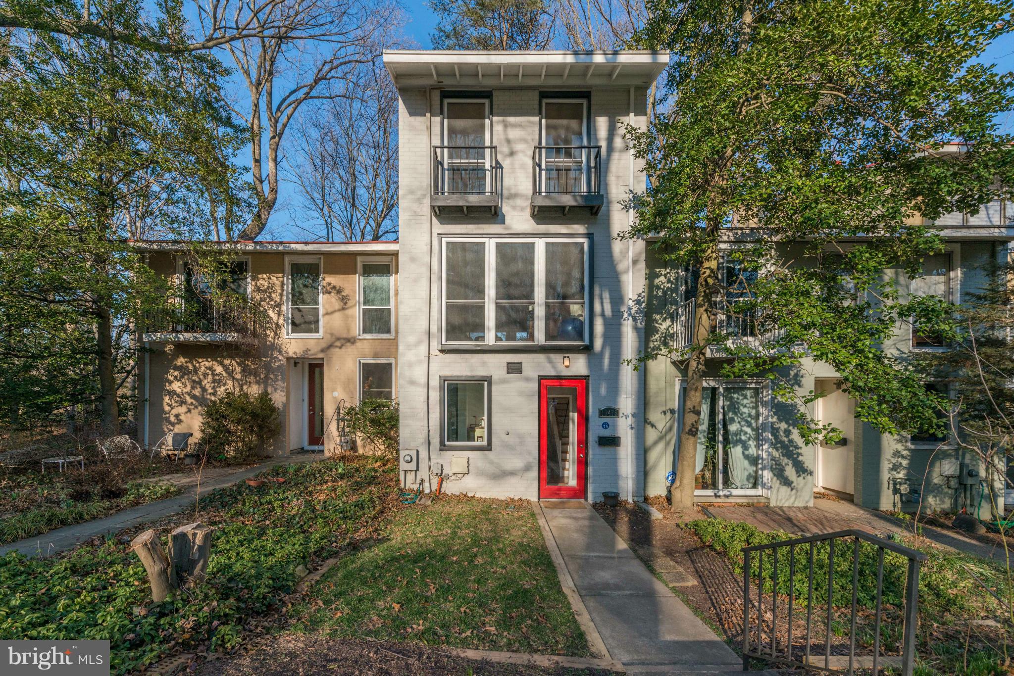 11475 Waterview Cluster Reston, VA 20190 - Photo 1 of 25 a front view of a house with a yard
