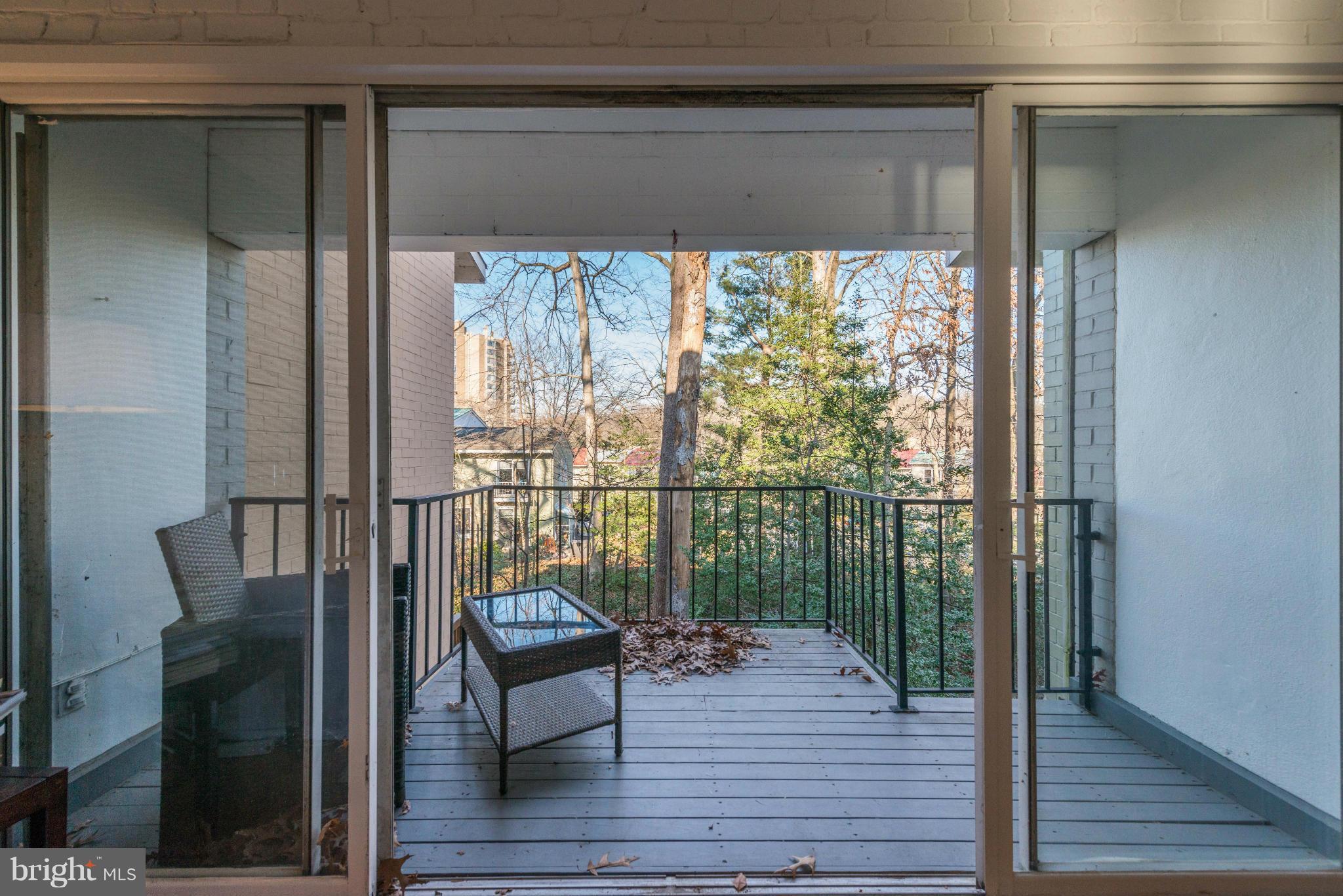 11475 Waterview Cluster Reston, VA 20190 - Photo 17 of 25 a view of a balcony and wooden floor