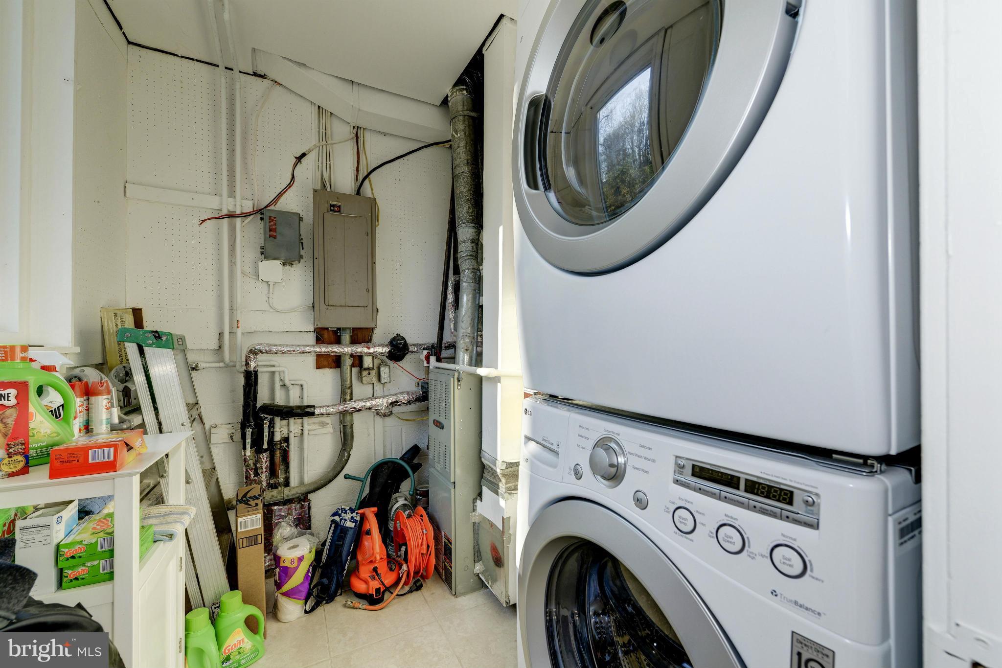 11475 Waterview Cluster Reston, VA 20190 - Photo 25 of 25 a utility room with dryer and washer