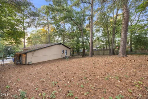 a view of a bathroom with a glass door and a shower
