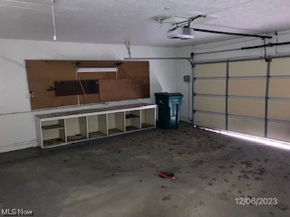 488 Catlin Road Cleveland, OH 44143 - Photo 18 of 23 Garage with a garage door opener