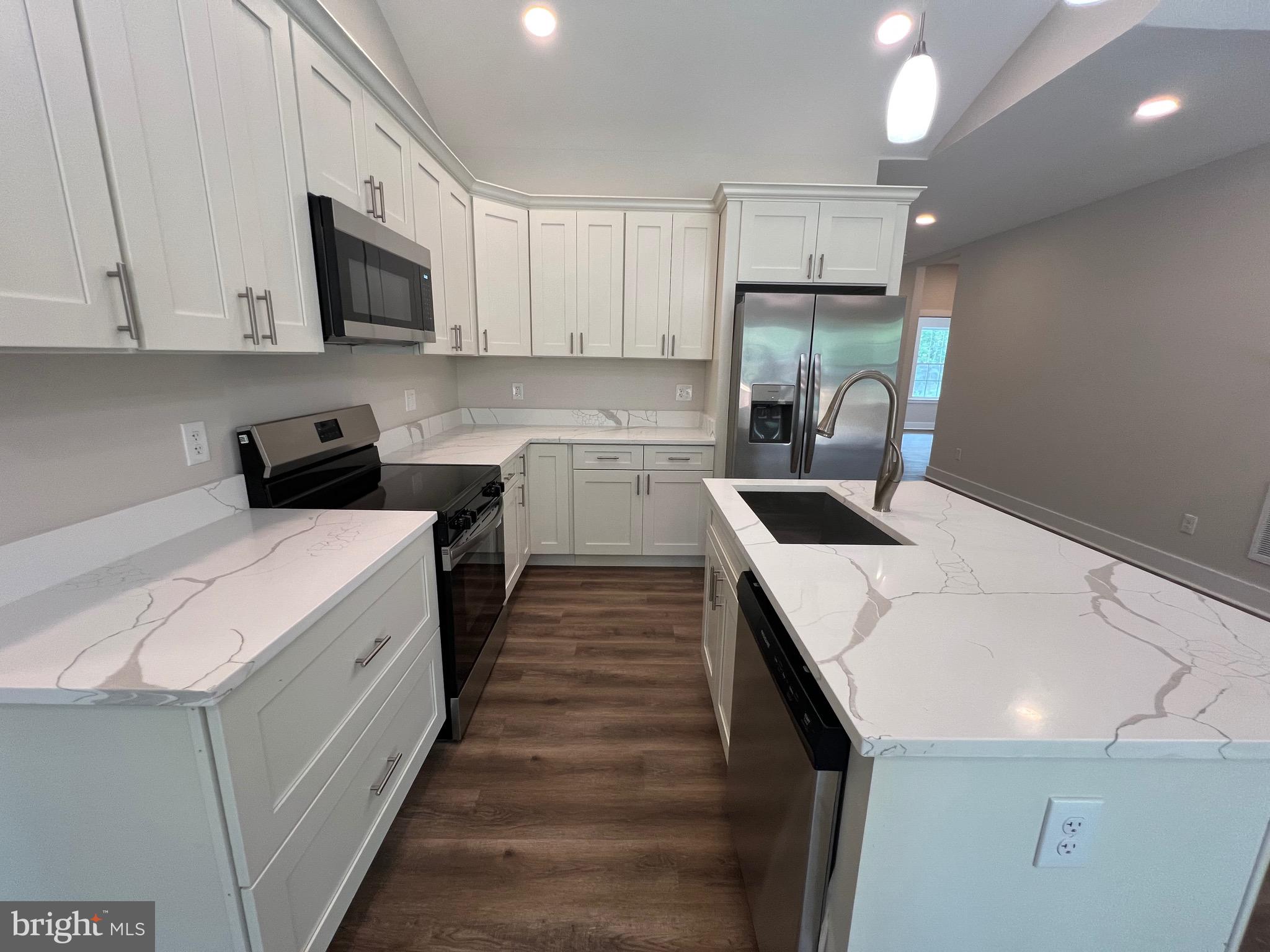 171 Wildwood Road Colonial Beach, VA 22443 - Photo 24 of 41 Kitchen w/ Quartz Countertops