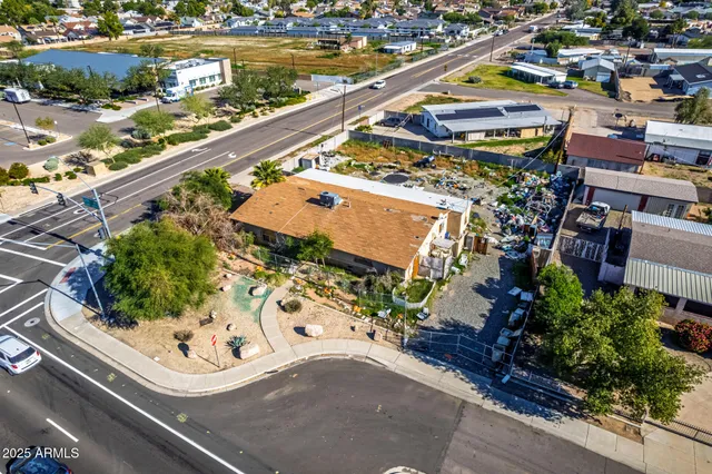an aerial view of a city with houses