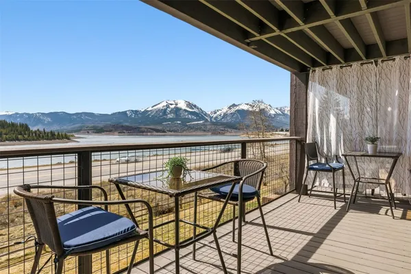 a view of a chairs and table on the terrace