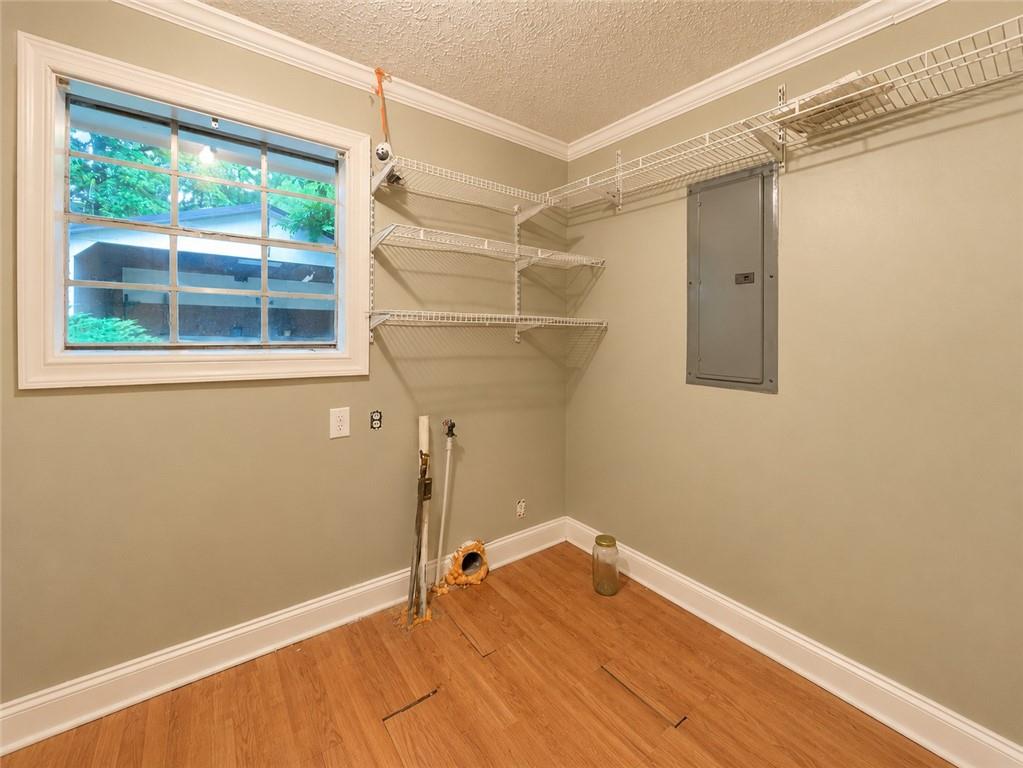212 Craigtown Road Northeast Calhoun, GA 30701 - Photo 16 of 21 a view of a room with wooden floor and white walls