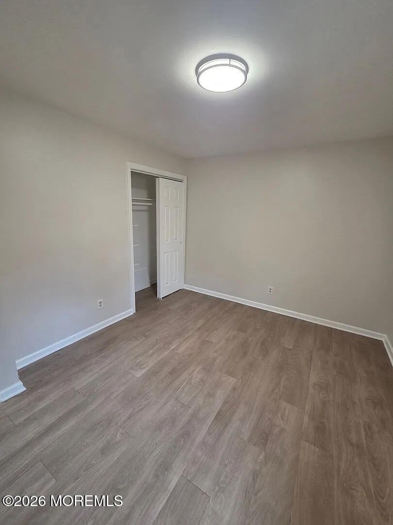 3 Freewood Street Howell, NJ 07731 - Photo 5 of 9 a view of an empty room with a window