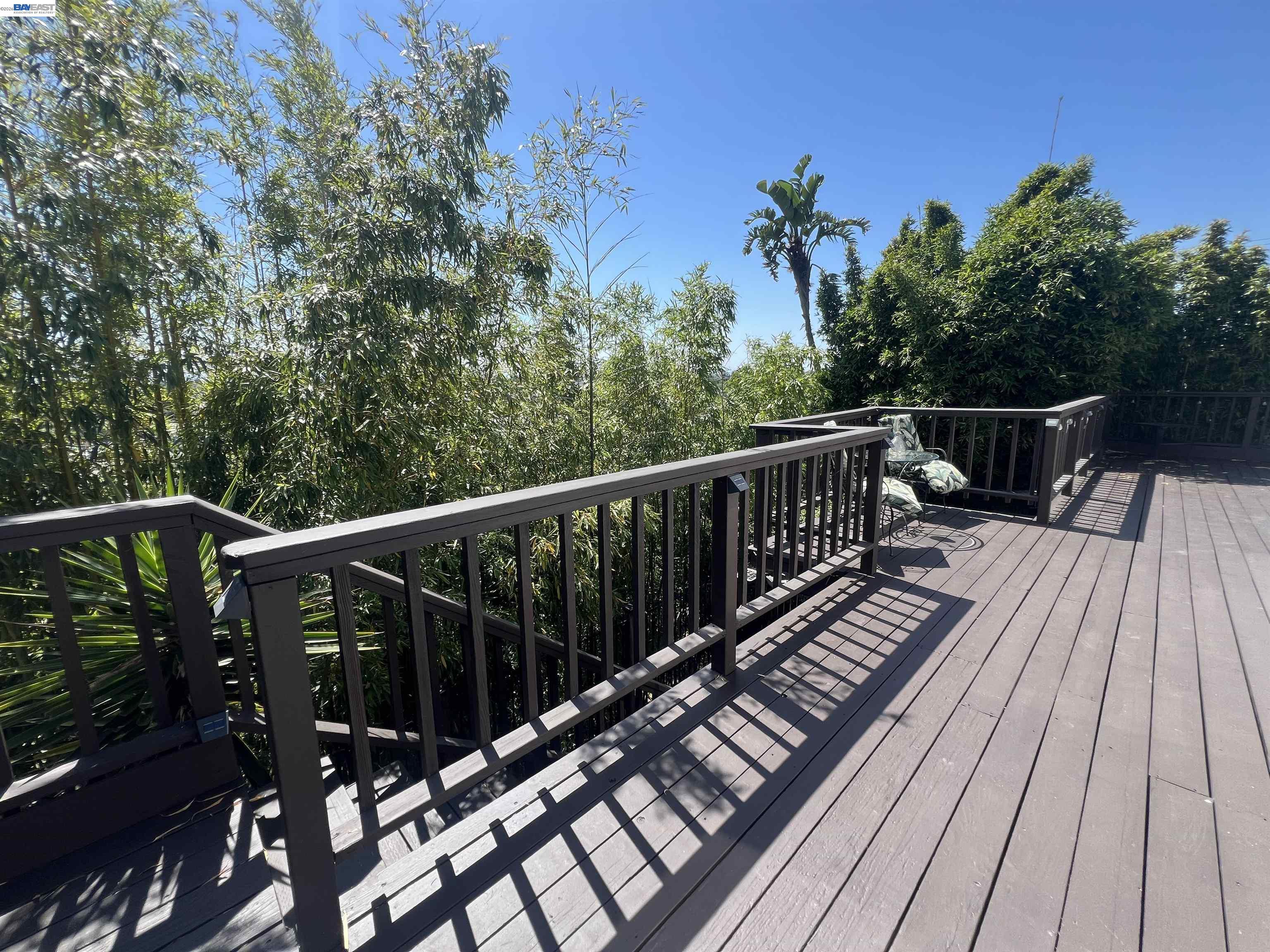 22111 Prospect Street Hayward, CA 94541 - Photo 23 of 70 a view of balcony with wooden floor and outdoor seating