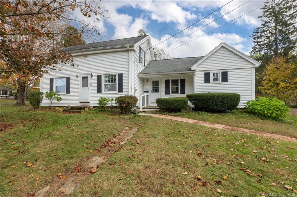 115 Hydeville Road Stafford, CT 06076 - Photo 1 of 1 a front view of a house with garden