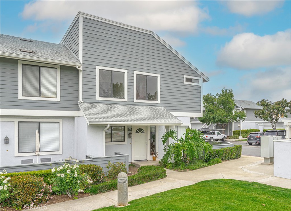 305 Huntington Irvine, CA 92620 - Photo 3 of 35 a front view of a house with a yard