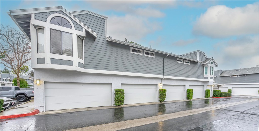 305 Huntington Irvine, CA 92620 - Photo 32 of 35 a view of a street with garage