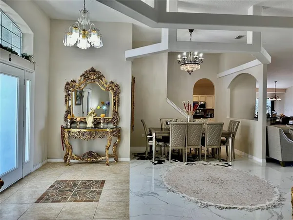 a living room with furniture and a rug