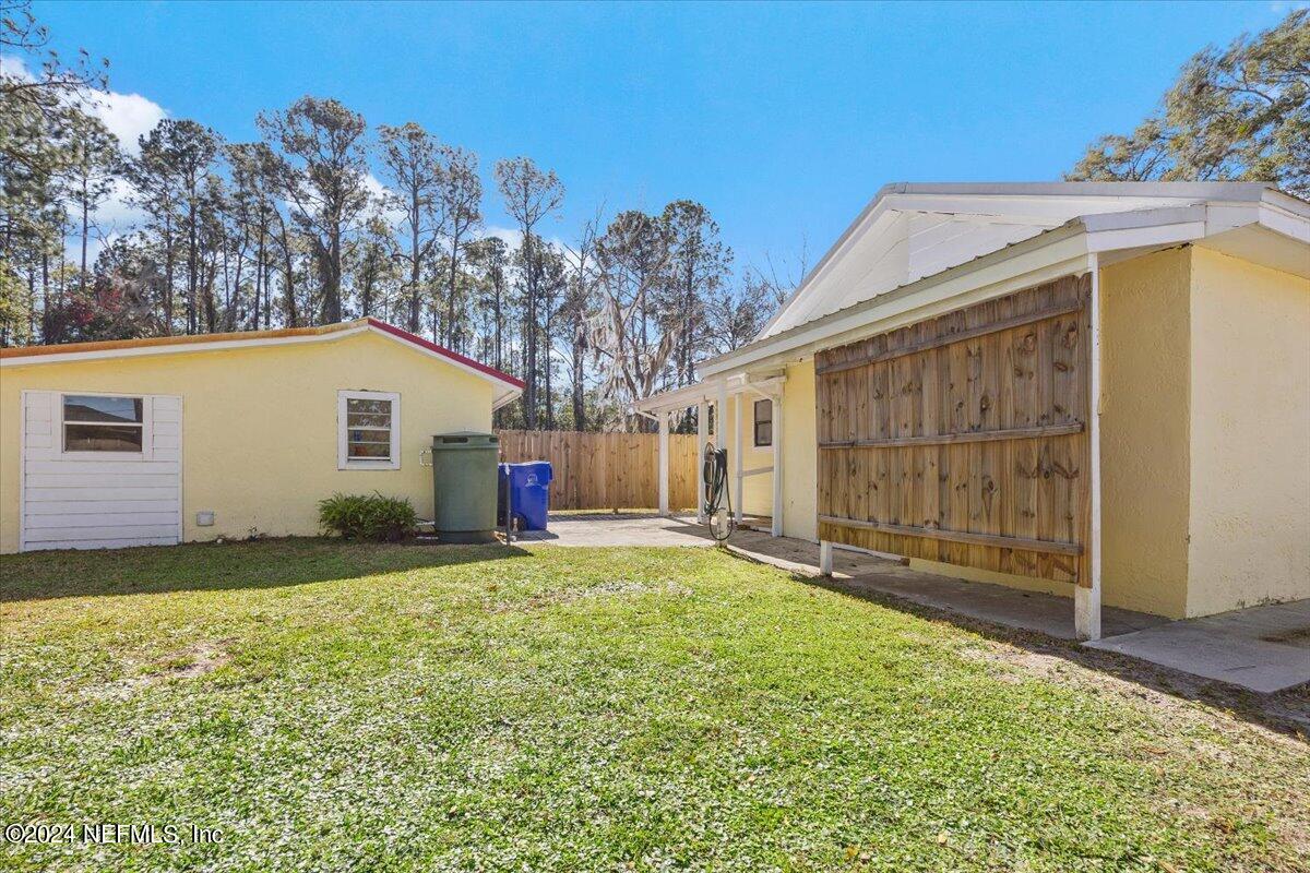 2610 Pacetti Road, Unit A St. Augustine, FL 32092 - Photo 14 of 31 a view of back yard of the house