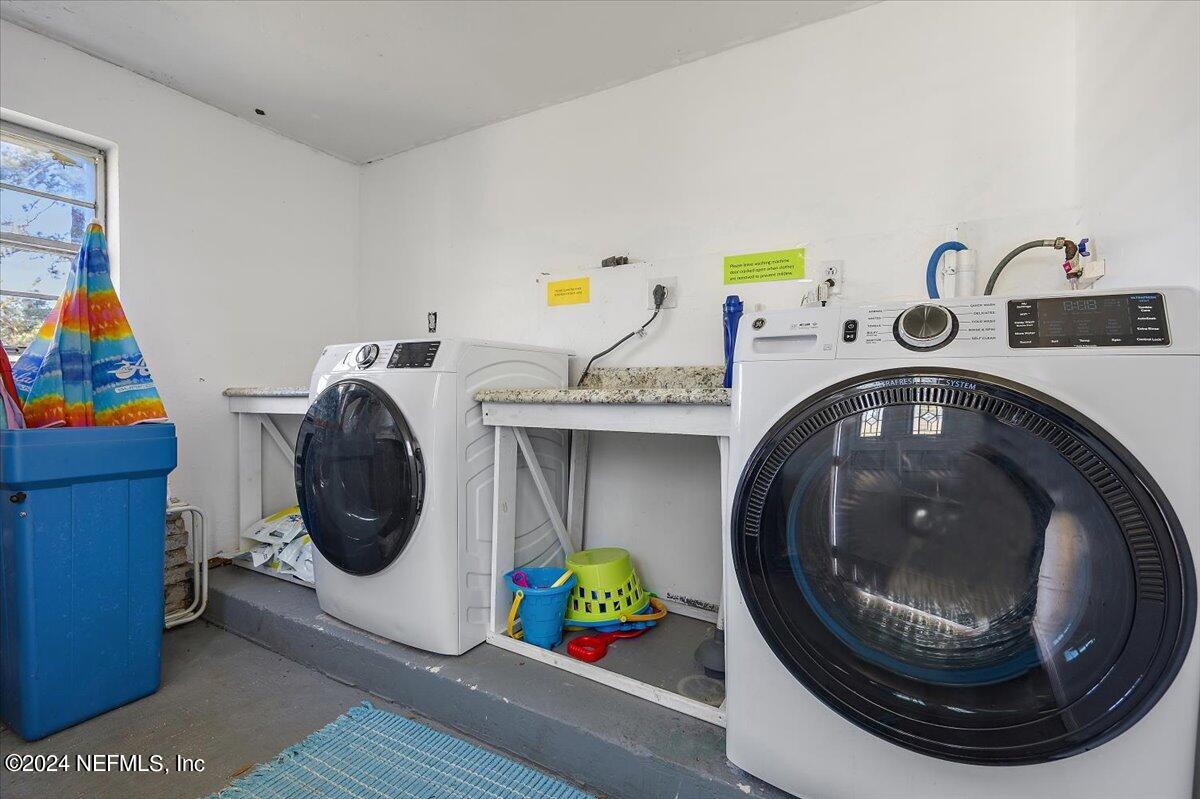 2610 Pacetti Road, Unit A St. Augustine, FL 32092 - Photo 15 of 31 a utility room with dryer and washer