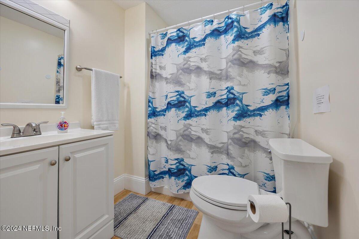 2610 Pacetti Road, Unit A St. Augustine, FL 32092 - Photo 24 of 31 a bathroom with a sink toilet and shower