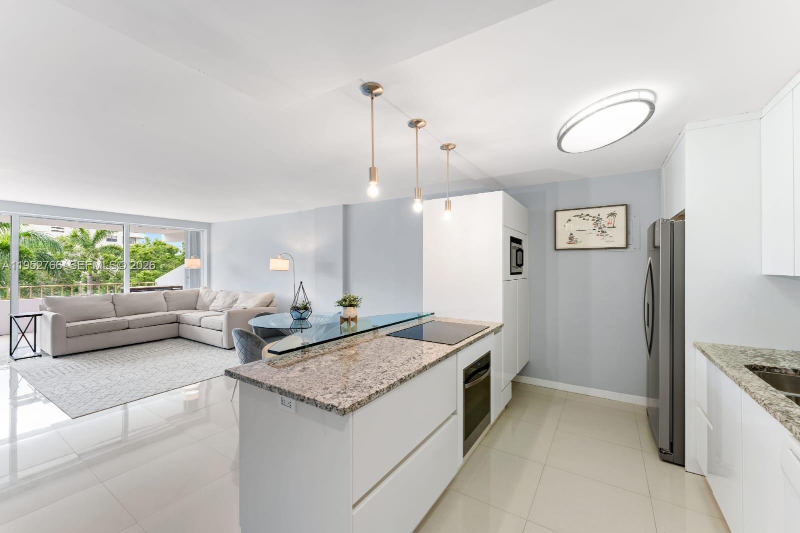 155 Ocean Ln Drive, Unit 407 Key Biscayne, FL 33149 - Photo 4 of 14 ISLAND IN KITCHEN