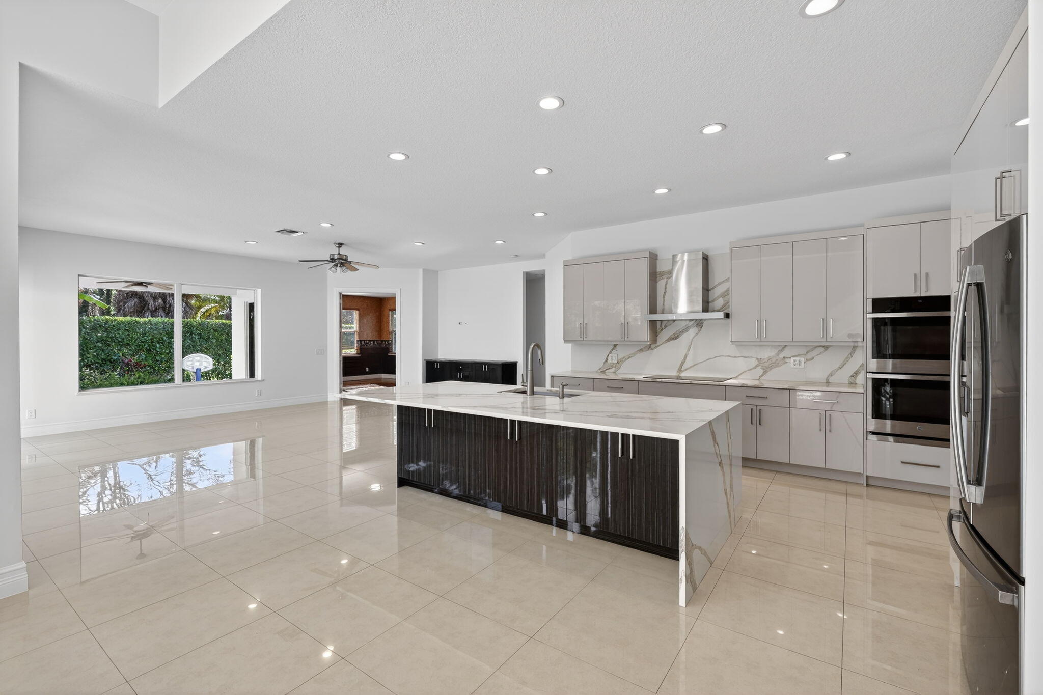 126 Bryce Lane Jupiter, FL 33458 - Photo 12 of 47 Living/ Kitchen/ Family Room