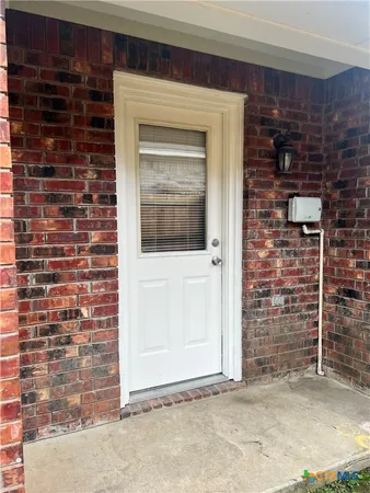 a front view of a house with a door