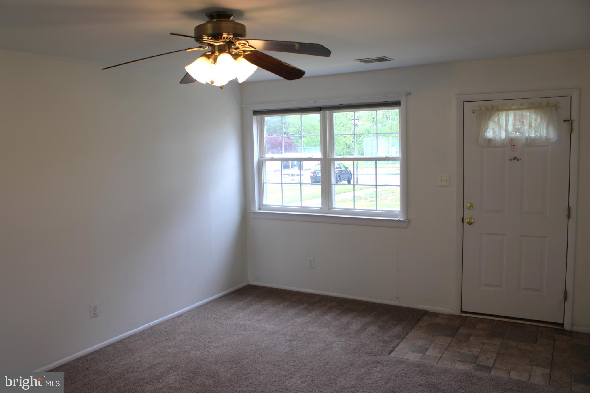 42 Forge Road Medford, NJ 08055 - Photo 3 of 10 a view of an empty room with a window
