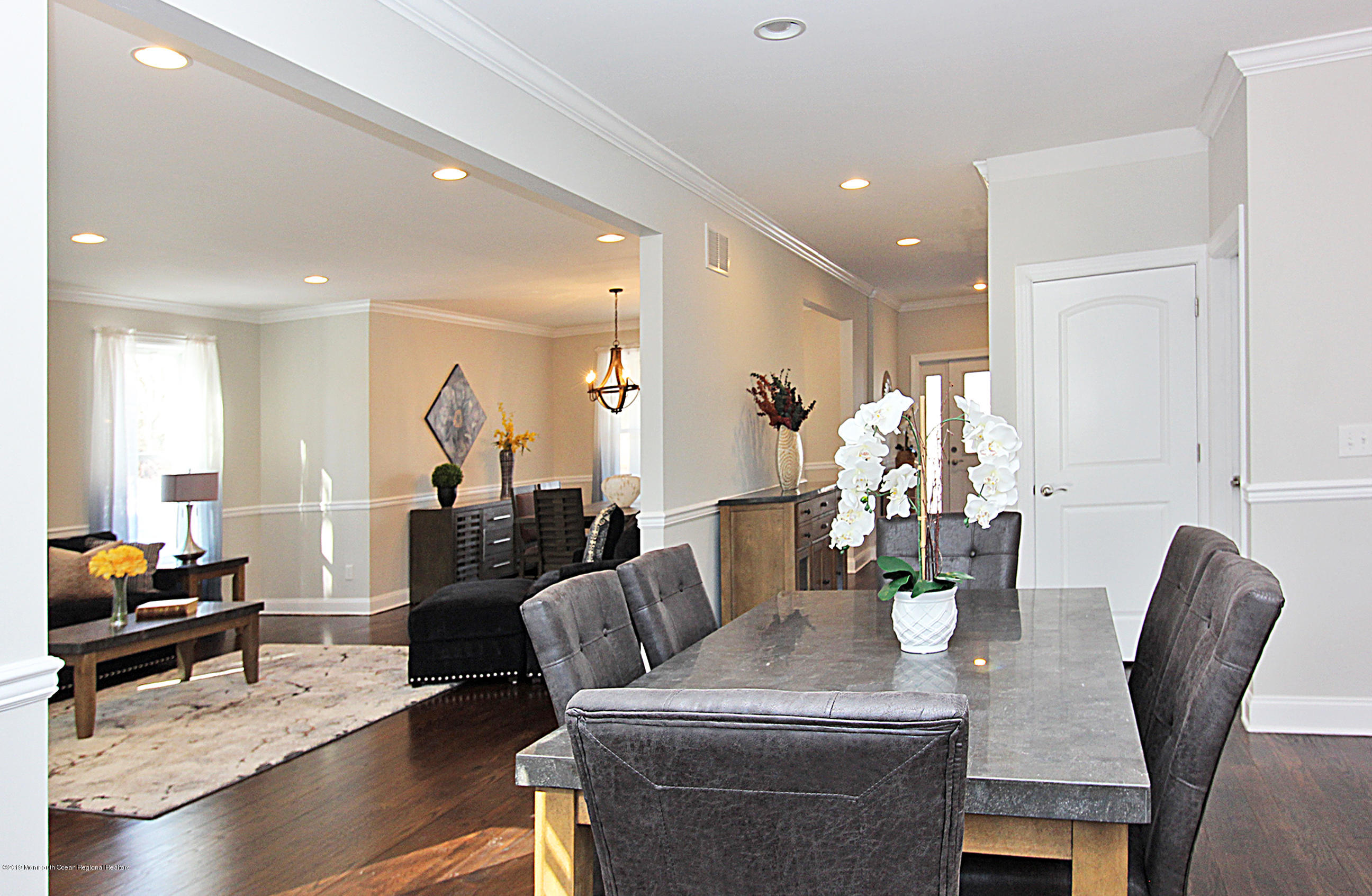 239 Old Mill Road Freehold, NJ 07728 - Photo 13 of 29 Kitchen to Living room & Hallway