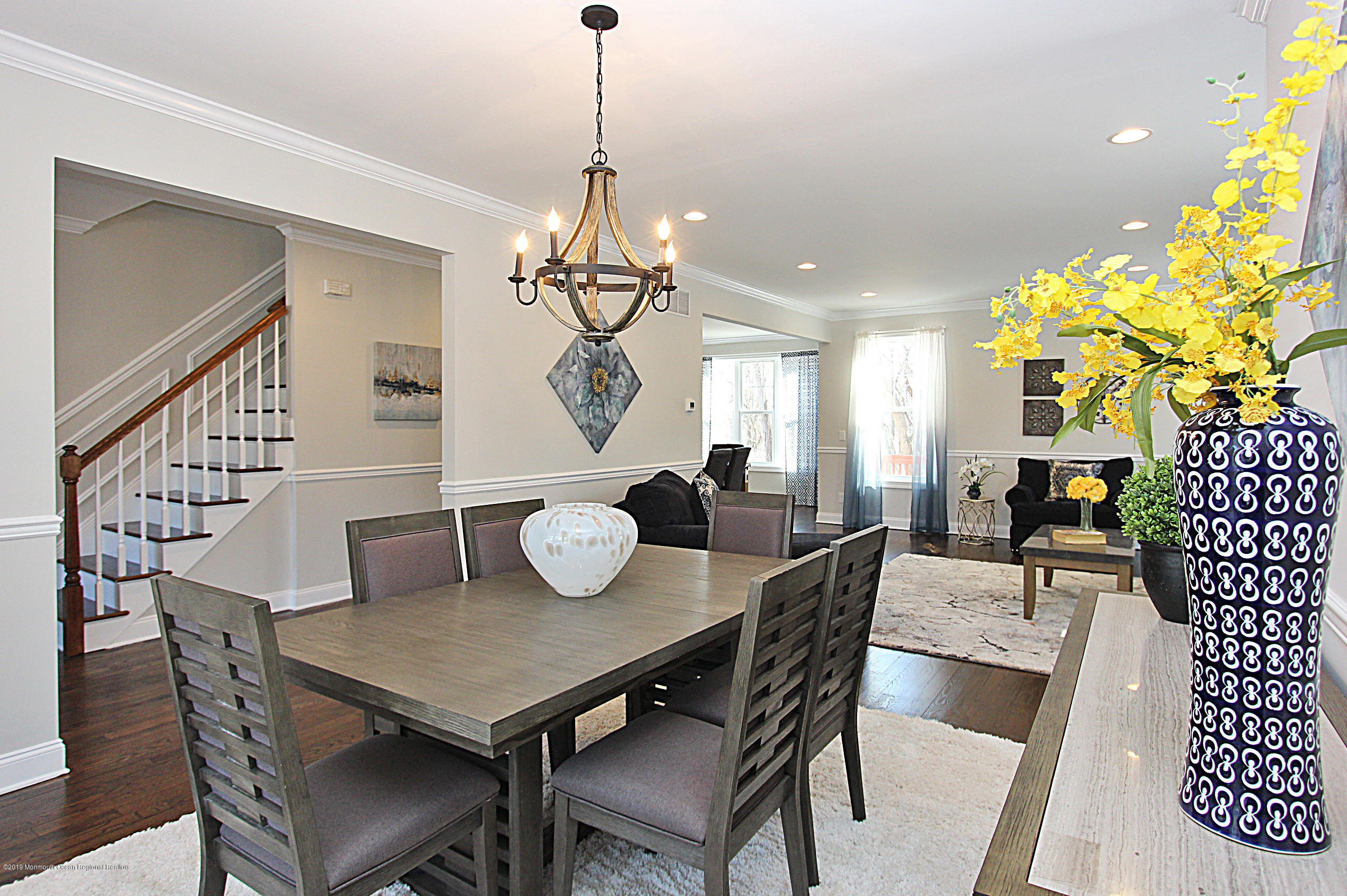 239 Old Mill Road Freehold, NJ 07728 - Photo 5 of 29 Dining room to Living room & hall view
