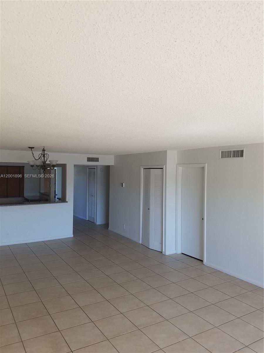 310 Racquet Club Road, Unit 204 Weston, FL 33326 - Photo 18 of 22 a view of empty room