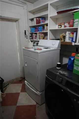 a room with a storage and utility