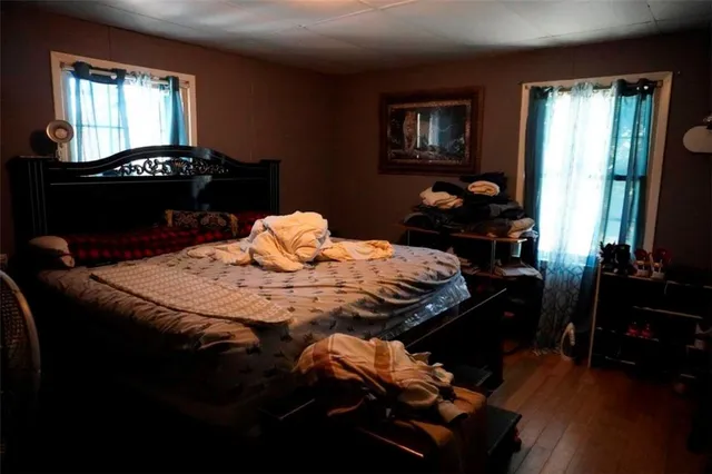 a room with furniture and flat screen tv