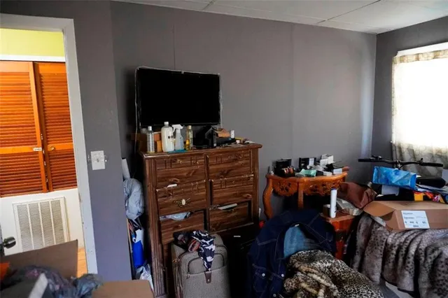 a kitchen with a stove and a refrigerator