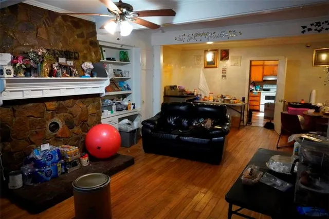 a room with furniture and wooden floor