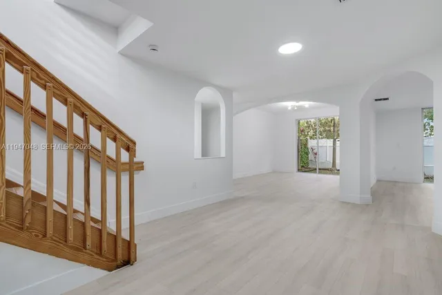 an empty room with windows