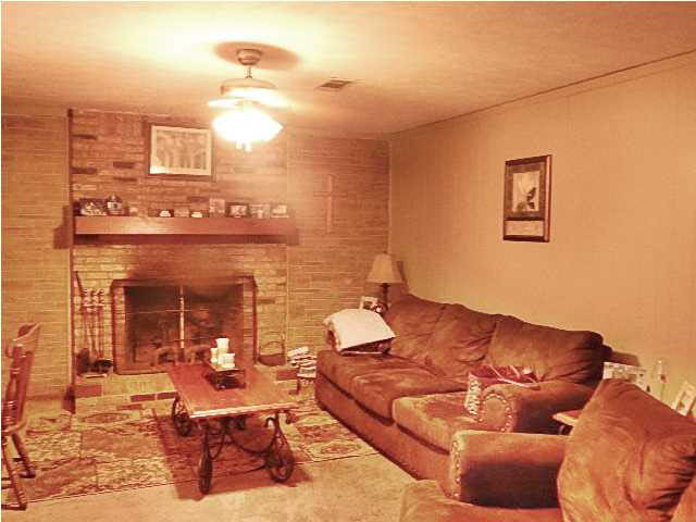 3855 North Midway Road Raymond, MS 39154 - Photo 11 of 18 family room wiuth fireplace