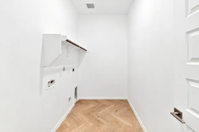 a view of a closet in the kitchen