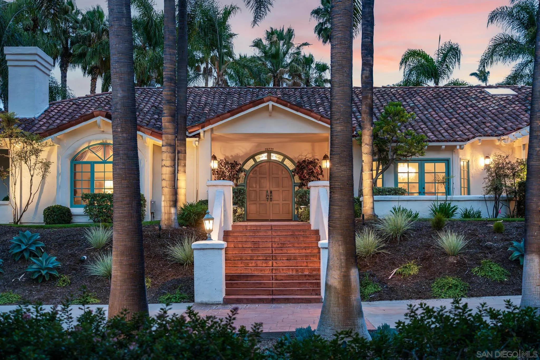 18221 Via Ascenso Rancho Santa Fe, CA 92067 - Photo 2 of 37 a front view of a house with garden