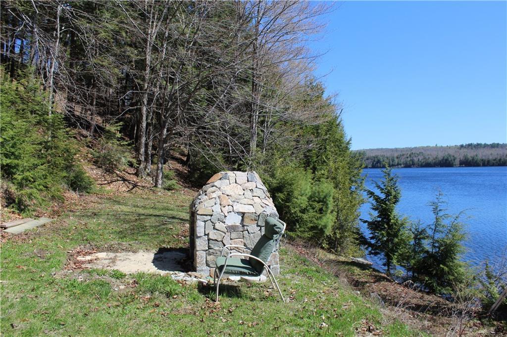257 Ironbound Pond Road Solon, ME 04979 - Photo 7 of 30 Large fire pit area with room for...