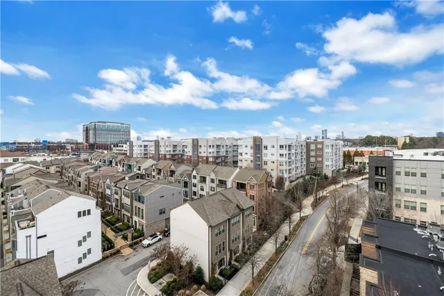 a view of a lake with a city