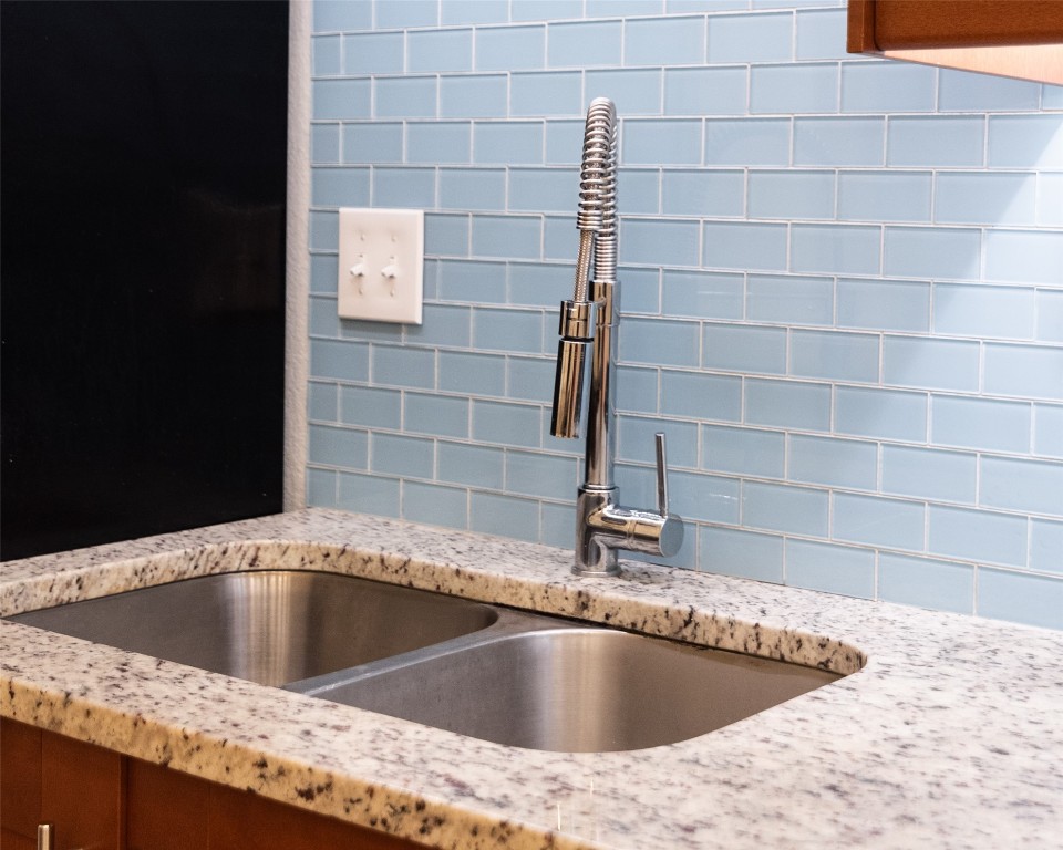 1309 East 52nd Street, Unit 2 Austin, TX 78723 - Photo 7 of 13 a view of a sink a mirror