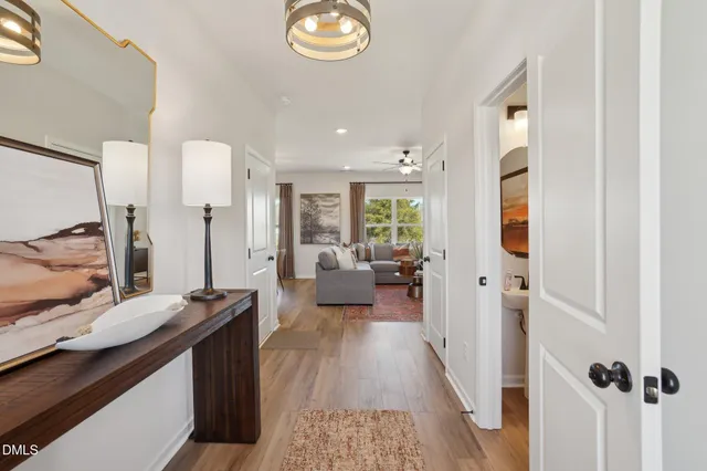 a living room with furniture and a table